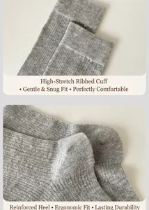 Detail of high-elastic ribbed cuffs and reinforced heel on grey knit socks