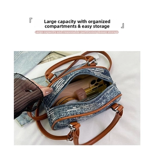 Detail view of denim sequin crossbody bag interior with phone and cosmetics