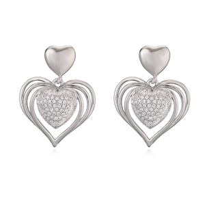 Elegant silver-toned copper earrings featuring layered hollow and crystal-studded hearts