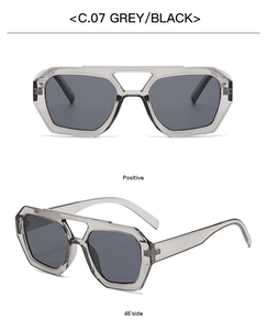 Detail view of grey irregular sunglasses with double bridge and black lenses C.07