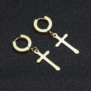 Unisex gold stainless steel hoop earrings with cross pendants on a black background