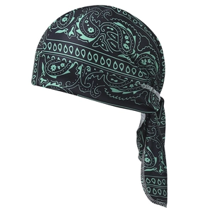 Detailed view of paisley patterns on breathable black and mint green pirate headscarf