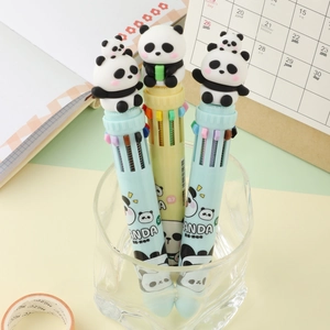 Detailed view of 10-color panda ballpoint pens in a glass cup for journaling and study