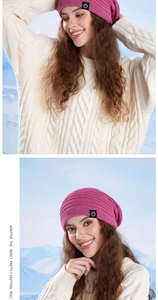 Detailed knit texture of a warm winter beret with logo patch for outdoor wear