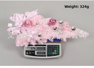 Detailed view of pink Christmas teardrop swag weighing 324g and measuring 60cm long