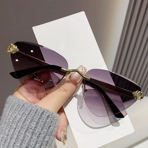 Frameless geometric sunglasses with purple gradient lenses and golden leopard accents