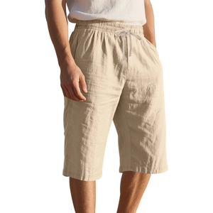 Detailed view of linen blend shorts featuring elastic drawstring waist and side pockets