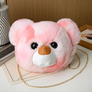 Close-up of pink and white plush bear bag with soft faux fur and elegant gold chain