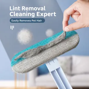 Manual pet hair remover tool for carpets and sofas with dual-sided lint cleaning brush