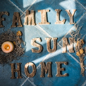 Detailed macro view of natural birch bark texture on decorative wooden letters