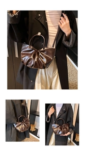 Detailed view of dark brown pleated cloud bag with high-gloss finish and adjustable strap