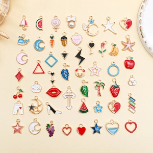 Mix of colorful enamel charms in shapes of stars, hearts and fruits for DIY jewelry making