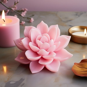 Close-up of pink lotus shaped wax candle with realistic multi-layered flower petals