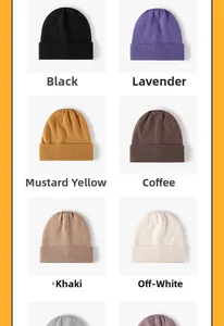 Detail view of winter beanies in multiple colors including black, khaki and off-white