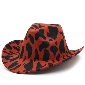 Macro view of thick felt fabric with cow print and edge stitching on the cowboy hat