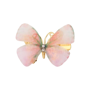 Detail einer Haarspange mit rosa-grünem Tüllschmetterling, Goldmetall und Strasssteinen