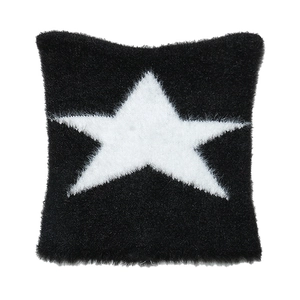 Faux fur square pillow featuring a plush black and white contrast with a large star pattern