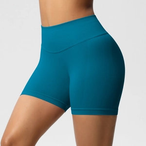 Détail du short de yoga sans couture bleu paon à taille haute avec ceinture côtelée