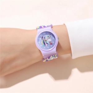 Close-up of kids quartz watch with 3D purple unicorn strap and rainbow dial design