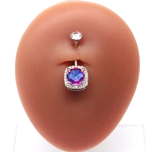 Detail view of silver belly ring with square purple iridescent stone and clear crystal