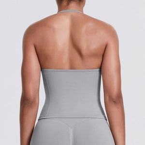 Detail view of seamless grey ribbed knit texture on high-waist fitness yoga set