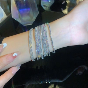 Elegant multi-layer silver bracelets with sparkling crystals in a stacked design