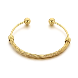 Minimalist 18K gold plated mesh spiral cuff bracelet with rounded ends on white background