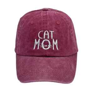 Washed burgundy cotton baseball cap featuring white CAT MOM embroidery and cat whiskers