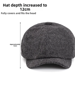 Detail of grey herringbone newsboy cap showing 12cm deep crown and thick tweed fabric