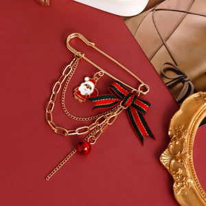 Christmas brooch with Santa Claus charm, red plaid bow and bell on gold pin
