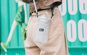 Adjustable light grey mesh water bottle carrier bag with crossbody strap for kids