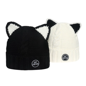 Winter knit cat ear beanies in black and white featuring thick cable knit texture