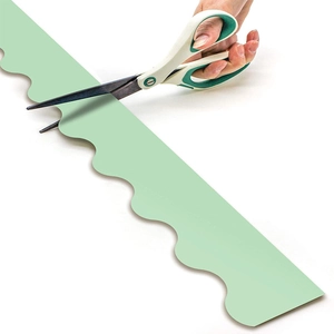 Mint green scalloped border trim for classroom bulletin board decor with easy cutting demo