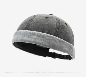 Detail of dark grey washed cotton miki hat with adjustable strap and six-panel stitching