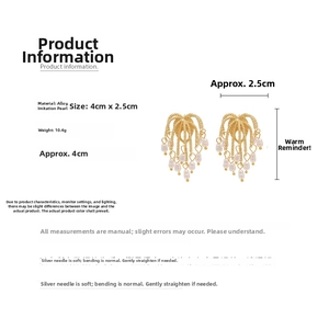 Detail showing dimensions and specifications of golden tassel pearl drop earrings