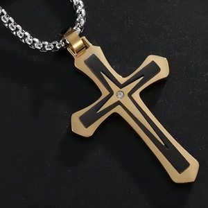 Double-layered gold and black cross pendant necklace with centered crystal on silver chain
