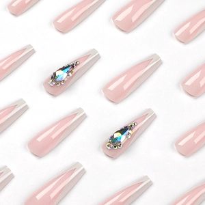 Long coffin french v-shape pink press-on nails with white tips and luxury rhinestones