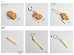 Detailed grid of PVC chicken nugget and french fries keychains with size measurements
