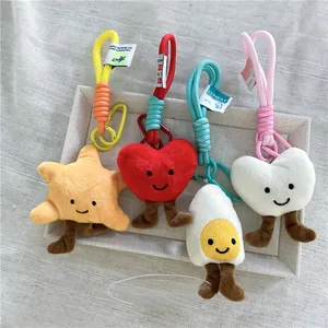 Ciondoli in peluche a stella e cuore con sorrisi e cordini intrecciati colorati
