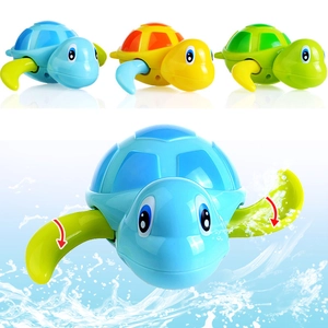 Wind-up turtle bath toys for kids in blue, yellow, and green swimming in water