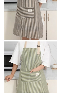 Detail of striped cotton linen aprons with adjustable neck straps and large pockets