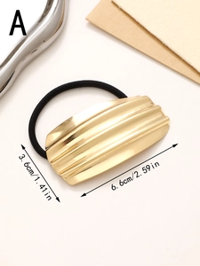Detail showing gold corrugated metal plate hair tie with dimensional measurements