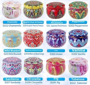 Detailed collection of 12 aromatic soy wax candles in decorative round tin jars