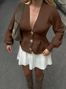 Elegant brown V-neck buttoned cardigan with lantern sleeves and a white pleated skirt
