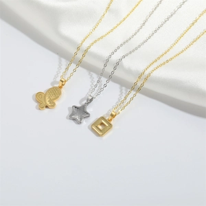 Minimalist gold and silver necklaces with butterfly, star, and square pendants