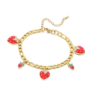 Gold strawberry pendant bracelet with red enamel and zircon charms on Figaro chain