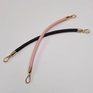 DIY replacement leather bag straps in black and pink with golden metal hooks on white background