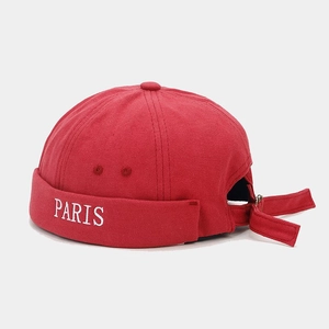 Red Docker Hat with white PARIS embroidery made of textured canvas material