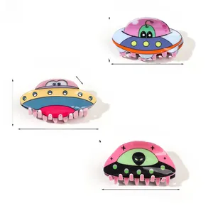 Close-up of acrylic UFO hair claws with detailed size measurements and weight specs