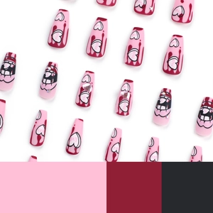 Pink heart coffin false nails with rhinestone accents and drip art design for women